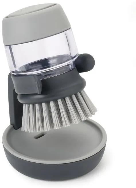 Kefa s dávkovačom saponátu a stojanom Joseph Joseph Palm Scrub šedá