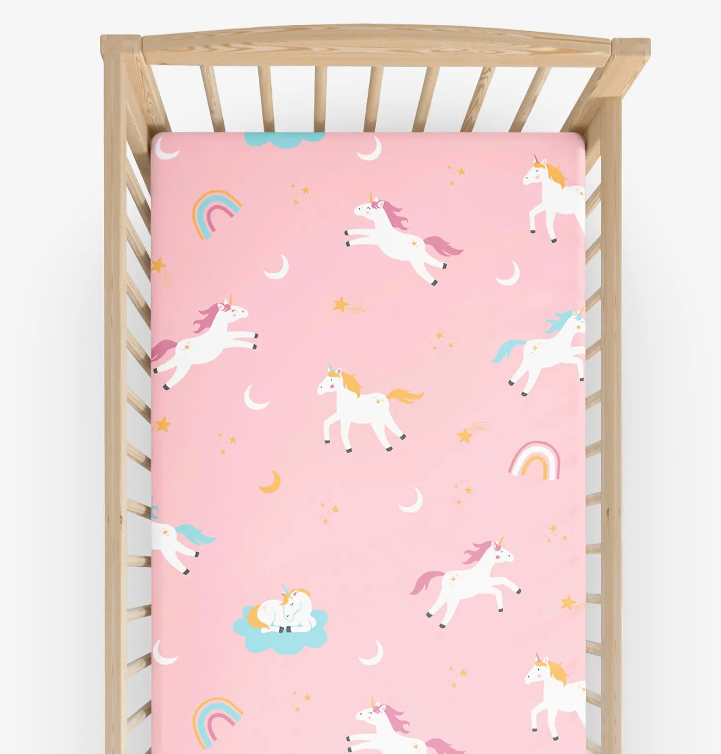 Goldea bavlnená napínacia plachta do detskej postieľky - veselí jednorožci 60 x 120 cm