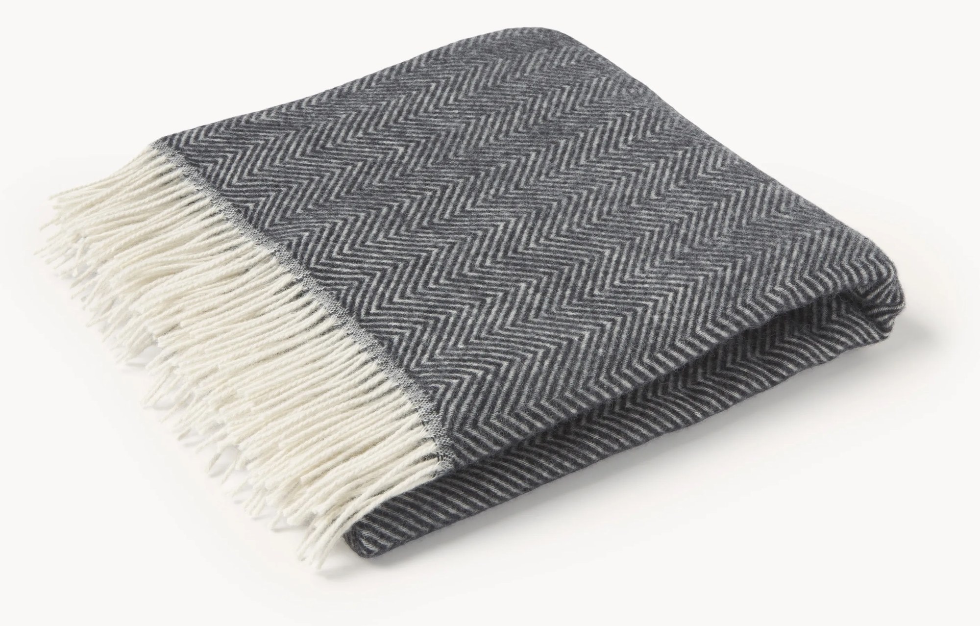 Vlnený prehoz so vzorom rybej kosti a strapcami Tyrol