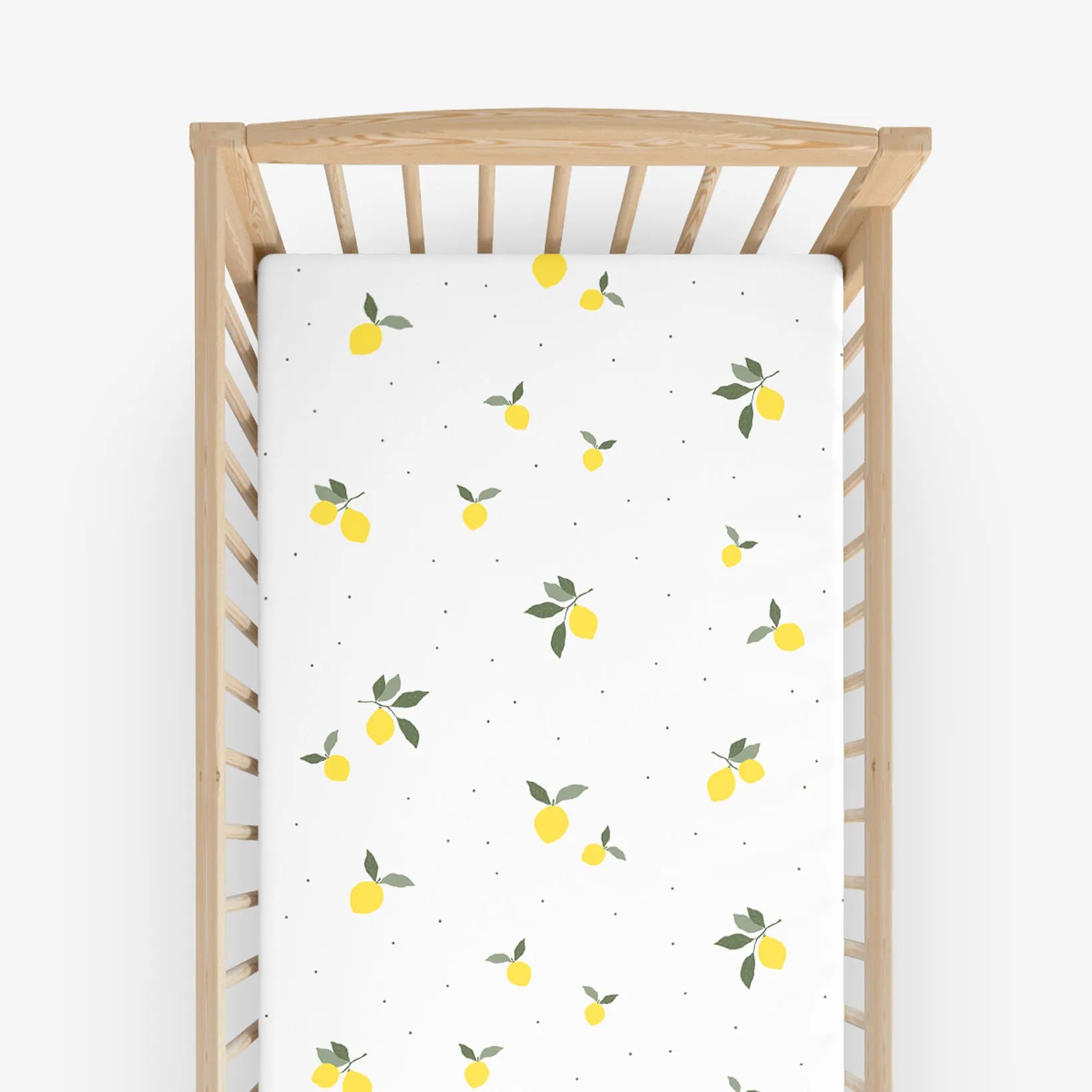 Goldea bavlnená napínacia plachta do detskej postieľky - citróny 60 x 120 cm